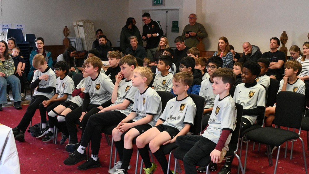group of children watching a presentation