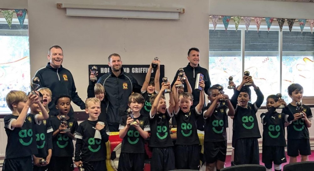 Group of children in AO shirts
