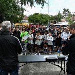 man giving speech to big crowd