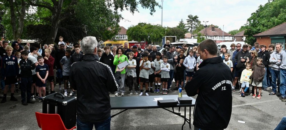 man giving speech to big crowd